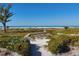 Wooden boardwalk leads to a pristine beach at 22 Seawatch Dr, Boca Grande, FL 33921