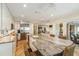 Updated kitchen featuring granite island and stainless steel appliances at 22 Seawatch Dr, Boca Grande, FL 33921