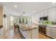 Modern kitchen with granite countertops and white cabinets at 22 Seawatch Dr, Boca Grande, FL 33921