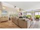 Spacious living room with vaulted ceilings, large windows, and comfortable seating at 22 Seawatch Dr, Boca Grande, FL 33921