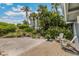 Relaxing patio area with seating and beautiful landscaping at 22 Seawatch Dr, Boca Grande, FL 33921