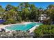 Relaxing community pool with plenty of lounge chairs at 22 Seawatch Dr, Boca Grande, FL 33921