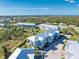 Aerial view of coastal townhouses with ocean views and ample parking at 3923 Cape Haze Dr # 306, Rotonda West, FL 33947