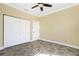 Well-lit bedroom featuring tile floors and double closets at 3923 Cape Haze Dr # 306, Rotonda West, FL 33947