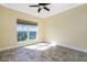 Bright bedroom with tile flooring and ceiling fan at 3923 Cape Haze Dr # 306, Rotonda West, FL 33947
