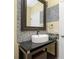 Updated bathroom with a modern sink and mosaic tile accents at 3923 Cape Haze Dr # 306, Rotonda West, FL 33947