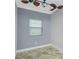Small room with tile floors, ceiling fan and window with blinds at 3923 Cape Haze Dr # 306, Rotonda West, FL 33947