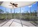 Relaxing screened porch with view of backyard and trees at 3923 Cape Haze Dr # 306, Rotonda West, FL 33947