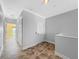 Hallway with tile floors and doors to bedrooms and closets at 3923 Cape Haze Dr # 306, Rotonda West, FL 33947