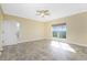 Well-lit bedroom with tile floors, ceiling fan, and large window at 3923 Cape Haze Dr # 306, Rotonda West, FL 33947