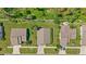 Aerial view showing home's location in a quiet residential neighborhood at 404 Cypress Forest Dr, Englewood, FL 34223