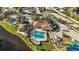 Community features a pool, tennis courts, and clubhouse at 404 Cypress Forest Dr, Englewood, FL 34223