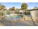 Relaxing community hot tub with surrounding patio at 404 Cypress Forest Dr, Englewood, FL 34223