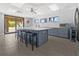 Modern community kitchen with island and stainless steel appliances at 404 Cypress Forest Dr, Englewood, FL 34223