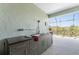 Covered outdoor space with full kitchen amenities and open backyard view at 552 Box Elder Ct, Englewood, FL 34223