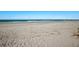 Beautiful beach with white sand and ocean waves at 5700 Gulf Shores Dr # C157, Boca Grande, FL 33921
