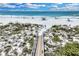 Beach access path leading to the sandy beach and ocean at 5700 Gulf Shores Dr # C157, Boca Grande, FL 33921