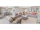 Open living area with coastal decor, and adjacent dining area at 5700 Gulf Shores Dr # C157, Boca Grande, FL 33921