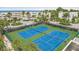 Two tennis courts with green and blue surface at 5700 Gulf Shores Dr # C157, Boca Grande, FL 33921