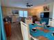Open-concept living and dining area offers ample space to relax and entertain at 5704 Holiday Park Blvd, North Port, FL 34287