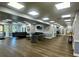 Spacious lounge area with comfortable seating, TV, and modern decor at 5704 Holiday Park Blvd, North Port, FL 34287