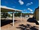 Well-maintained pool area with ample seating and a covered patio at 5704 Holiday Park Blvd, North Port, FL 34287