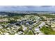Community overview showcasing various homes and landscaping at 9085 Pinehaven Way, Englewood, FL 34224