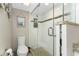 Updated bathroom with a large walk-in shower and granite finishes at 1551 Beach Rd # 213, Englewood, FL 34223