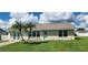 One-story home with light-colored brick and landscaping at 13528 Martha Ave, Port Charlotte, FL 33981