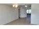 Bright living room with tiled floors and a ceiling fan at 13528 Martha Ave, Port Charlotte, FL 33981