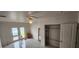 Laundry room with French doors, ceiling fan, and closet at 13528 Martha Ave, Port Charlotte, FL 33981