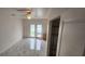 Bright laundry room with French doors and a large closet at 13528 Martha Ave, Port Charlotte, FL 33981