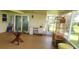 Spacious screened porch with glass-top table and chairs at 13528 Martha Ave, Port Charlotte, FL 33981