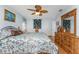 Main bedroom with a king-size bed and large dresser at 6455 Coniston St, Port Charlotte, FL 33981