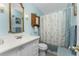 Clean bathroom with vanity, toilet and shower at 6455 Coniston St, Port Charlotte, FL 33981