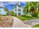 View of condo building with landscaping at 19385 Water Oak Dr # L-106, Port Charlotte, FL 33948