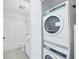 Stackable washer and dryer in a convenient laundry closet at 19385 Water Oak Dr # L-106, Port Charlotte, FL 33948