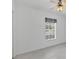 Light and airy bedroom with window coverings and tile flooring at 19385 Water Oak Dr # L-106, Port Charlotte, FL 33948