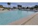 Relaxing community pool perfect for swimming and recreation at 404 Cypress Forest Dr, Englewood, FL 34223