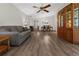 Spacious living room featuring hardwood floors and ample natural light at 404 Cypress Forest Dr, Englewood, FL 34223