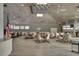 Large community clubhouse with high ceilings and ample seating at 404 Cypress Forest Dr, Englewood, FL 34223