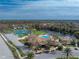 Community features pool, tennis courts, and clubhouse at 552 Box Elder Ct, Englewood, FL 34223