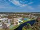 Community features pool, tennis courts, and clubhouse at 552 Box Elder Ct, Englewood, FL 34223