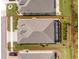 Bird's eye view of a single Gathering home with a large backyard and screened lanai at 552 Box Elder Ct, Englewood, FL 34223