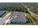 Single Gathering home with a screened lanai and a large backyard at 552 Box Elder Ct, Englewood, FL 34223