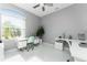 Home office with two desks and plenty of natural light at 14344 Amestoy Ave, Port Charlotte, FL 33981
