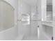 Clean, modern shower with glass enclosure and mosaic tile accents at 14344 Amestoy Ave, Port Charlotte, FL 33981