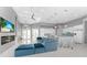 Open living area with sectional sofa, fireplace, and view of pool at 14344 Amestoy Ave, Port Charlotte, FL 33981