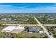 Aerial view of house and surrounding community at 14344 Amestoy Ave, Port Charlotte, FL 33981