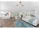 Open concept living room, kitchen, and dining area with modern finishes at 4199 Hollis Ave, Port Charlotte, FL 33953